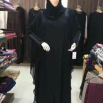 Butterfly abaya with elegant lacework on chiffon fabric and inner formal fabric, offering a stylish and modest design.
