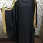Nida butterfly abaya with delicate embroidery on the sleeves, offering a flowing and elegant design.