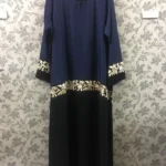 Nida front open abaya with intricate embroidery, offering a stylish and modest design.
