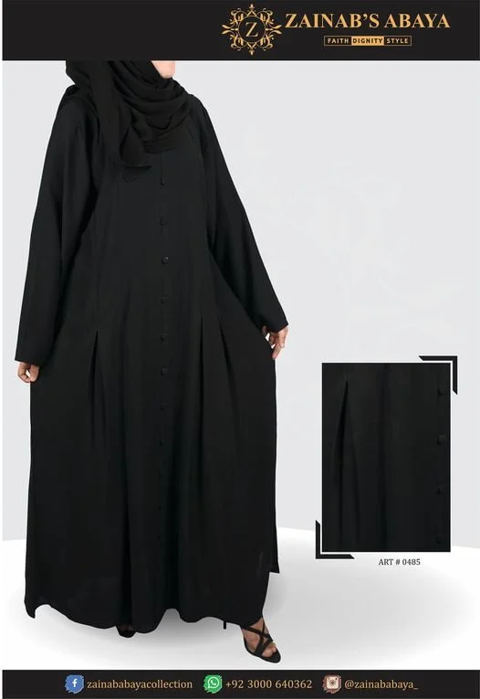 Maxi Abaya Nida black maxi abaya with pleated design, offering a modest and elegant look.