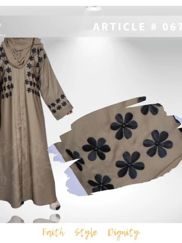 Front Open Gown Abaya Nida color front open gown abaya with embroidery on the front and sleeves, and pearl work on the sleeves, offering a stylish and elegant design.