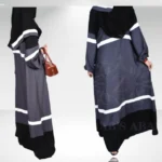 Nida maxi abaya with a chiffon scarf, offering a sleek and modest design.