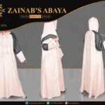 Color maxi abaya in Nida fabric with a hoody and chiffon print on the shoulders and arms, offering a modern and stylish look.