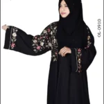 Nida color maxi abaya with intricate embroidery on both shoulders and sleeves, offering a stylish and elegant design.