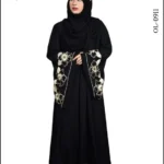 Nida umbrella abaya with intricate embroidery on the sleeves, offering a flowing and elegant design.