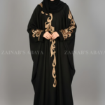 New butterfly abaya with intricate embroidery on one side of the front and sleeves, offering a stylish and modest design.