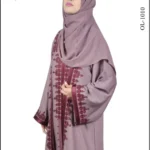 Nida double gown abaya with elegant embroidery, offering a layered and sophisticated design.