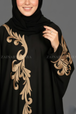 New butterfly abaya with intricate embroidery on one side of the front and sleeves, offering a stylish and modest design.