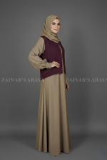 Nida maxi abaya in waistcoat style, offering a modern and modest design with a layered look.