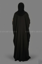 New butterfly abaya with intricate embroidery on one side of the front and sleeves, offering a stylish and modest design.