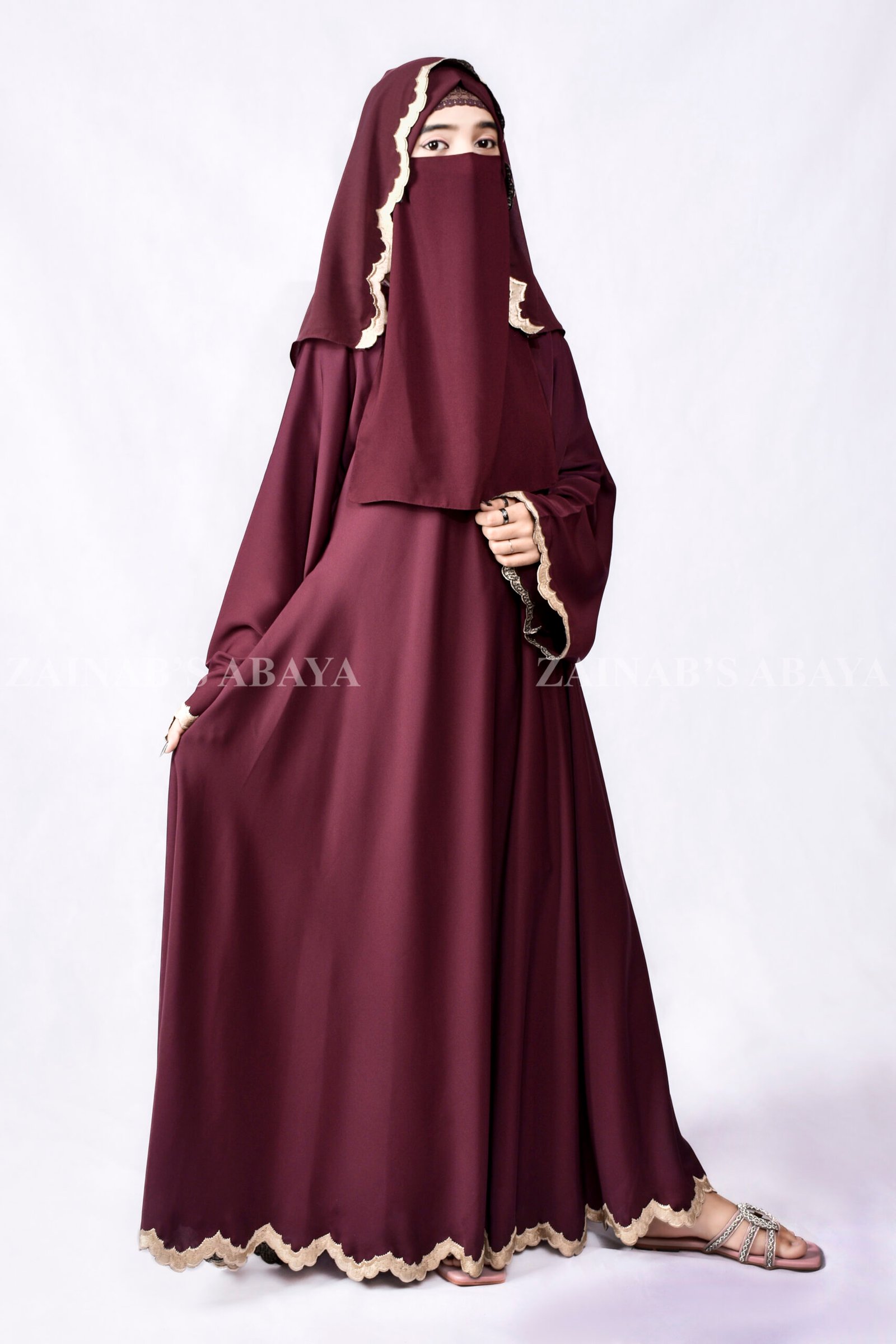 Umbrella Gown Abaya - Zainab Designer Abaya Umbrella Gown Abaya with stylish embroidery crafted in nida korean fabric and a matching scarf in chiffon fabric.