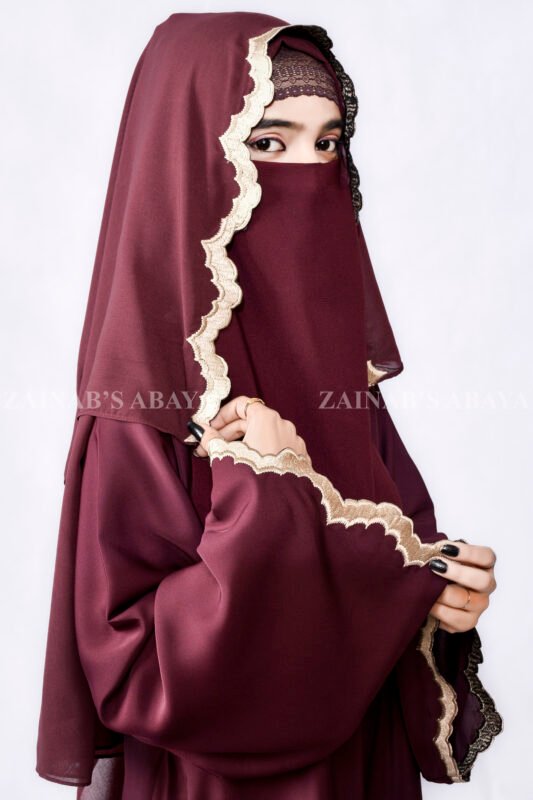 Umbrella Gown Abaya with stylish embroidery crafted in nida korean fabric and a matching scarf in chiffon fabric.
