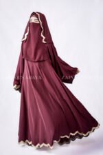 Umbrella Gown Abaya with stylish embroidery crafted in nida korean fabric and a matching scarf in chiffon fabric.