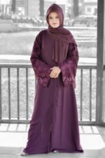 Front Open Abaya in Purple Colored which is crafted in Nida Korean Fabric with Embroidery on Sleeves and motif on the same matching scarf in chiffon fabric.