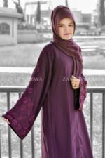 Front Open Abaya in Purple Colored which is crafted in Nida Korean Fabric with Embroidery on Sleeves and motif on the same matching scarf in chiffon fabric.