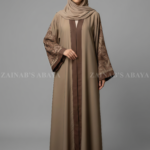 Nida front open gown abaya with delicate embroidery on the sleeves, offering a modest and stylish design.