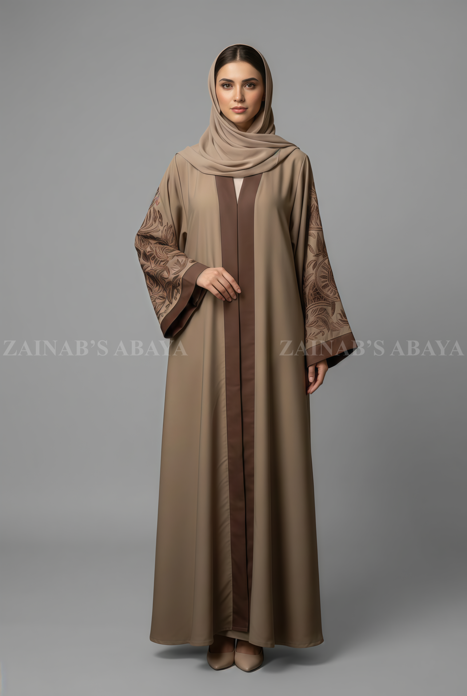 Front Open Gown Abaya Nida front open gown abaya with delicate embroidery on the sleeves, offering a modest and stylish design.