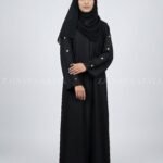 Nida front open gown abaya with a sleek and elegant design, perfect for modern modest fashion.