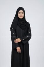 Nida front open gown abaya with a sleek and elegant design, perfect for modern modest fashion.