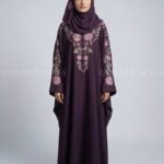 Kaftan abaya with elegant embroidery in Nida fabric, offering a flowing and modest design.