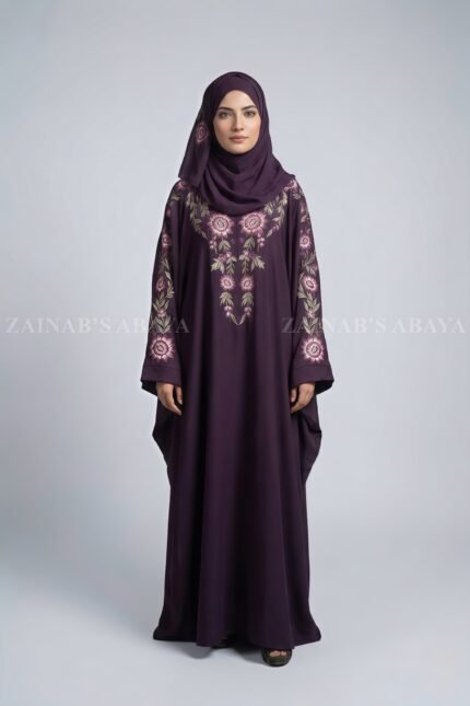 Kaftan abaya with elegant embroidery in Nida fabric, offering a flowing and modest design.
