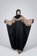 Butterfly abaya with flowing design and intricate embroidery, offering an elegant and modest look.