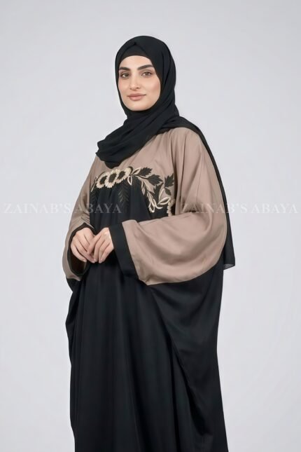 Butterfly abaya with flowing design and intricate embroidery, offering an elegant and modest look.