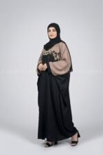 Butterfly abaya with flowing design and intricate embroidery, offering an elegant and modest look.
