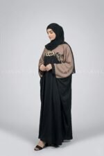 Butterfly abaya with flowing design and intricate embroidery, offering an elegant and modest look.