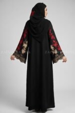 Nida color front open gown abaya with intricate embroidery on the sleeves, offering a stylish and elegant design.