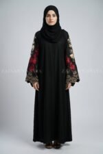 Nida color front open gown abaya with intricate embroidery on the sleeves, offering a stylish and elegant design.