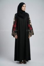 Nida color front open gown abaya with intricate embroidery on the sleeves, offering a stylish and elegant design.
