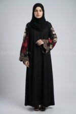Nida color front open gown abaya with intricate embroidery on the sleeves, offering a stylish and elegant design.