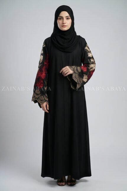 Nida color front open gown abaya with intricate embroidery on the sleeves, offering a stylish and elegant design.