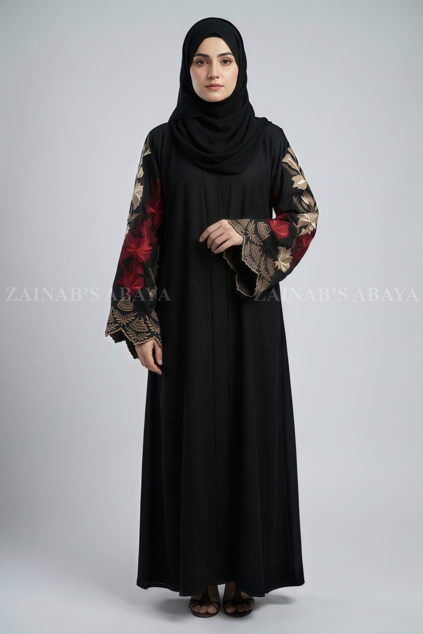 Front Open Gown Abaya Nida color front open gown abaya with intricate embroidery on the sleeves, offering a stylish and elegant design.