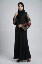 Nida color front open gown abaya with intricate embroidery on the sleeves, offering a stylish and elegant design.