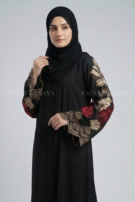 Nida color front open gown abaya with intricate embroidery on the sleeves, offering a stylish and elegant design.