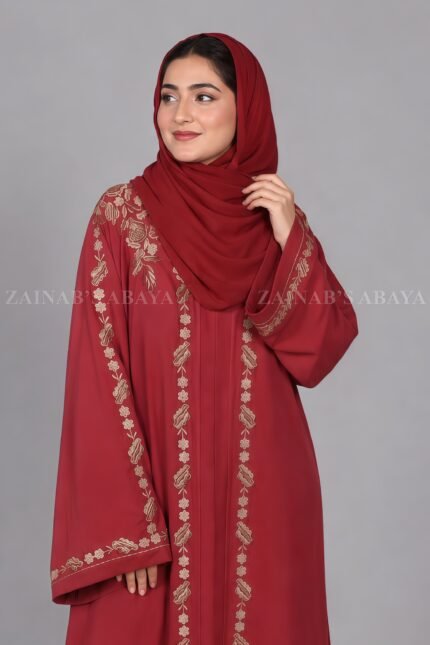 Nida front open gown abaya with intricate embroidery on the front, back, and sleeves, offering a stylish and modest design.