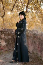Elegant black abaya with detailed embroidery for a sophisticated and modest look.