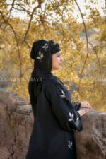 Elegant black abaya with detailed embroidery for a sophisticated and modest look.