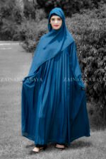 Maxi Abaya in nida korean fabric wth plates style on the front and a matching color scarf.