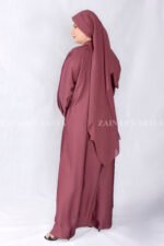 Nida Maxi Abaya in Maroon Color with Plates and Cuff Style Sleeves as well as a matching scarf in chiffon fabric.