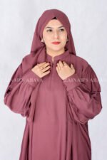 Nida Maxi Abaya in Maroon Color with Plates and Cuff Style Sleeves as well as a matching scarf in chiffon fabric.