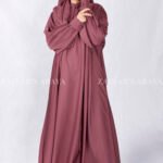 Nida Maxi Abaya in Maroon Color with Plates and Cuff Style Sleeves as well as a matching scarf in chiffon fabric.