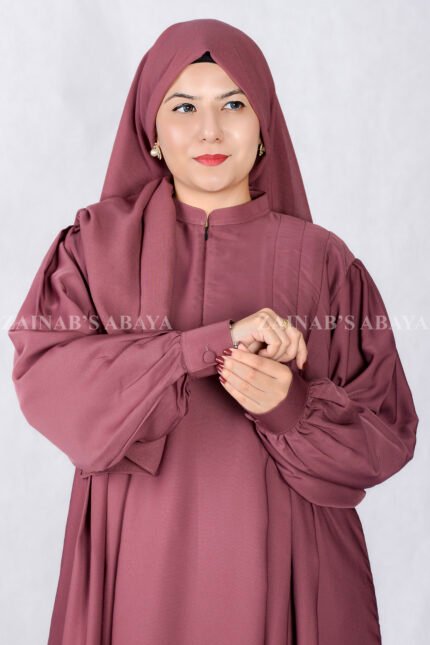 Nida Maxi Abaya in Maroon Color with Plates and Cuff Style Sleeves as well as a matching scarf in chiffon fabric.