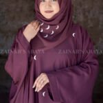 A kaftan Abaya in Nida Korean Fabric with White Color Embroidery in Moon Style.