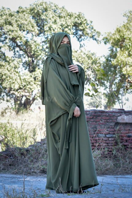 A elegant kaftan abaya with Tie Style on Sleeves and Inner Maxi the abaya color is Olive Green.