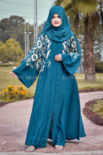 Nida Front Open Abaya with Embroidery on Front & Sleeves in Zinc and tilla gold color combination on front & sleeves as well as same color staler with embroidery motif.