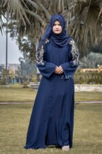 Maxi Abaya in Nida Korean Fabric with Embroidery on Sleeves and Back with same color scarf and embroidery motive.