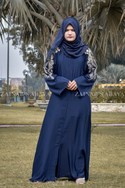Maxi Abaya in Nida Korean Fabric with Embroidery on Sleeves and Back with same color scarf and embroidery motive.